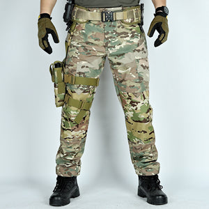 Camouflage tactical pants with tactical belt and gear on a white background