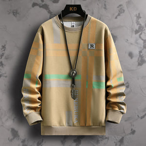 Plaid patterned sweater with brand logos on a textured gray background