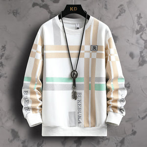 Plaid patterned shirt on a hanger with a gray background