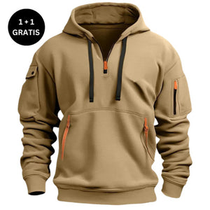 Tan hoodie with orange zippers on a white background