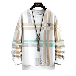 White sweater with plaid pattern on a hanger